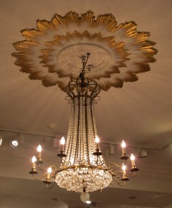 Beautiful crystal chandeliers provide light all over the store